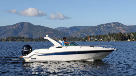 boat on lake surrounded by mountains blue sky generated with Z-Image