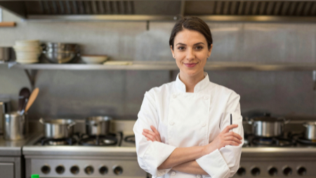 female chef standing arms folded in restaurant kitchen generated with Z-Image
